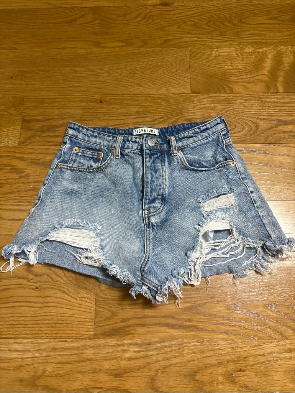 Signature Ripped Light Blue Denim Cutoff Shorts